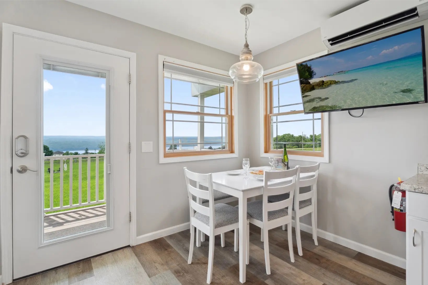 Full villa kitchen with oven, range, full-size refrigerator, coffee maker, and adjoining dining area